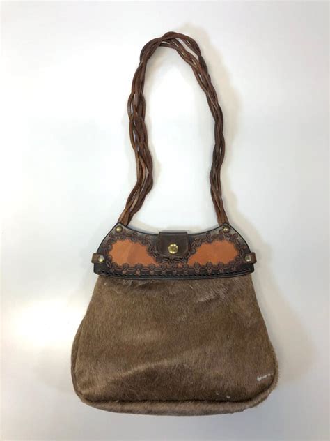 if you own calf hair / pony hair bags, come in, please :)